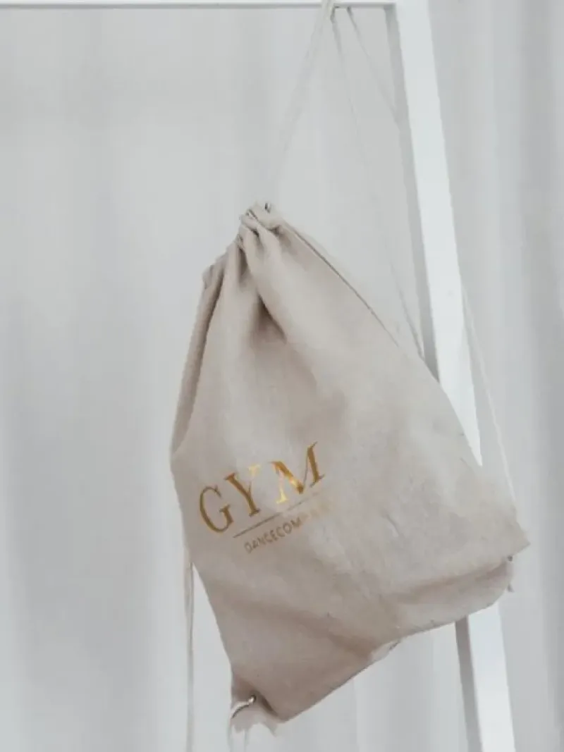 Dansebutikken Andet Til Gymnastik-Hør rygsæk/mulepose med guld GYM skrift
